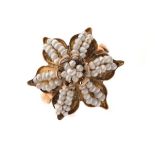 Seed pearl set flowerhead design dress ring, the shank stamped C.18, size O, 2.9g gross approx