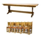 Good quality reproduction carved oak dining suite comprising: refectory table having a carved frieze