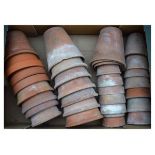 Approximately thirty terracotta/clay plant pots, the largest approximately 15cm high Condition: