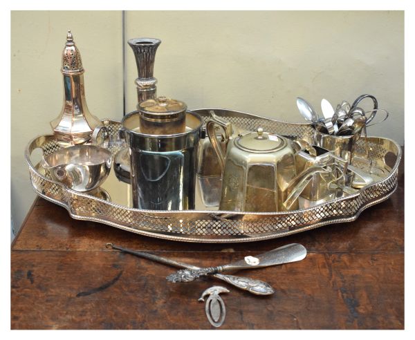 Selection of plated wares to include; serpentine gallery tray, sugar sifter, etc Condition: