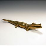 Bronzed table top nut cracker in the form of a crocodile Condition: