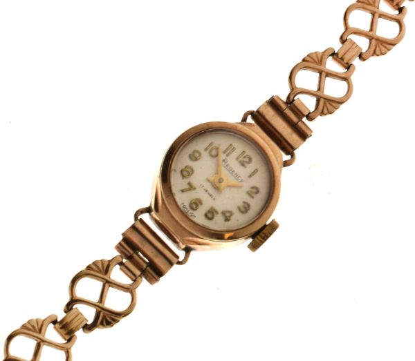 Lady's 9ct gold wristwatch, the Arabic dial marked 'Regency', manual wind movement marked 17