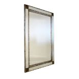Modern rectangular wall mirror having a bevelled plate within silvered frame and four bevelled