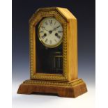 Late 19th Century German pine and rosewood veneered cased mantel clock by Junghans, the off-white