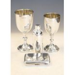 Two George V silver goblets, London 1926 and 1927, an Elizabeth II miniature silver cocktail shaker,