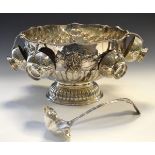 20th Century silver-plated on copper punch bowl with wavy gadrooned rim, ladle and six punch cups,