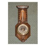 Mid 20th Century oak-cased aneroid barometer with thermometer, 39cm high Condition: