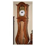 Reproduction French walnut cased Comtoise longcase clock having a typical baluster shaped case, arch