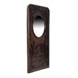 Early 20th Century heavily carved oak framed wall mirror having corn and poppy decoration, overall