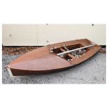 GP14 type wooden hull dinghy approximately 14 feet in length with aluminium boom by Proctor Masts,