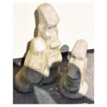 Garden Ornaments - Two figures in the manner of Easter Island 'Moai', the larger 56cm high (2)
