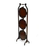 1930's mahogany three-tier folding cake stand with octafoil shelves Condition: