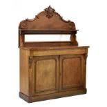 Victorian mahogany chiffonier, with scroll carved pediment over shelf and mirror, the lower stage