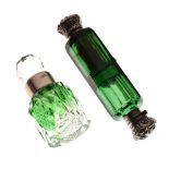 Green glass double ended scent bottle having unmarked white metal screw and hinged covers,