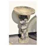 Garden Ornaments - Reconstituted birdbath with dished circular top on figural pedestal support, 42cm