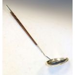 Georgian unmarked white metal toddy ladle having an oval bowl and a turned hardwood handle
