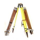 Three assorted mid 20th Century wooden tripods for theodolites or similar Condition: