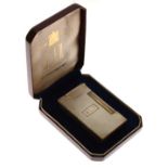 Dunhill sterling silver lighter having engine turned decoration and monogram G.L.S, cased Condition: