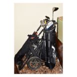 Set of King Cobra 3100 golf clubs, together with a Taylor Made driver, Supalite bag and Powakaddy