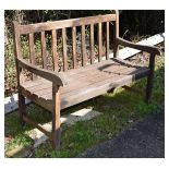 Teak garden bench of slatted design, 122cm wide Condition: