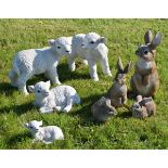 Eight assorted plastic garden ornaments comprising: four Rabbits and four Lambs, largest rabbit 54cm