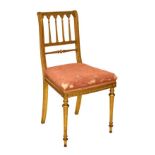 19th Century giltwood side chair having a fluted spindle back, stuffed seat and standing on