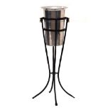 Aluminium champagne bucket on black metal stand Condition: