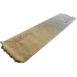 Large Chinese cream-ground wool runner, approx 3 metres in length Condition: