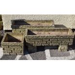 Three various reconstituted garden planters simulating 'Cotswold Stone' comprising two troughs and a