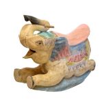 Indian carved and painted wooden rocking elephant, 66cm long x 59cm high Condition: