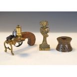 Reproduction Tinder pistol, a cast brass figure of a Lincolnshire Imp and a resin inkwell Condition: