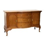 1920's period mahogany bow-breakfront sideboard fitted three drawers between cupboards on cabriole