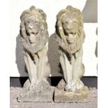 Pair of reconstituted stone lions, 58cm high Condition: