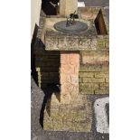 Garden sundial and pedestal simulating 'Cotswold Stone' with circular metal sundial plate over