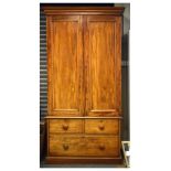 Victorian mahogany double wardrobe enclosing wooden peg hooks and hanging space over two short and