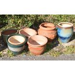 Seven assorted garden planters, the largest 42cm high (7) Condition: