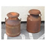 Two vintage iron milk churns, the larger 51cm high (2) Condition: