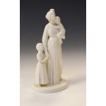 Royal Copenhagen white glazed figure group depicting a mother with children Condition: