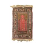 Middle Eastern prayer rug having typical central arcaded decoration within multi borders, 140cm x