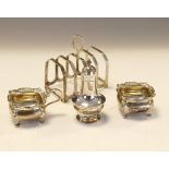 George V silver four division toast rack, Birmingham 1933, a George V silver pepperette, Sheffield