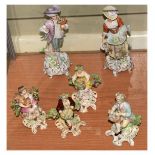 Four 19th Century porcelain bocage figures, together with a pair of Continental figures Condition: