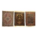 Three small Middle Eastern rugs, average size of 91cm x 61cm Condition: