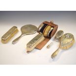Assorted silver-backed dressing table wares to include; cased pair of George V oval clothes brushes,