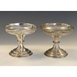 Pair of Edward VII silver pedestal bon bon or sweetmeat dishes, each with dished circular top and