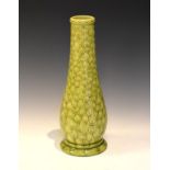 Burmantofts Faience bottle vase of bulbous form with textured cellular decoration and light green