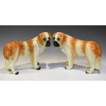 Unusual pair of late 19th/early 20th Century Staffordshire or Alloa pottery dogs modelled as St