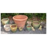 Large terracotta finish garden planter, together with other garden planters and figures