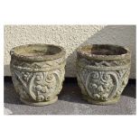 Pair of modern garden planters with classical decoration in relief