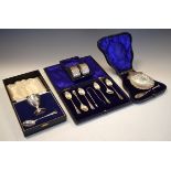 Four items of cased silverware comprising: Edward VII shell butter and knife set, London 1905, cased