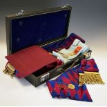 Masonic Interest - Case of regalia including; apron, sashes, together with a gilt white metal